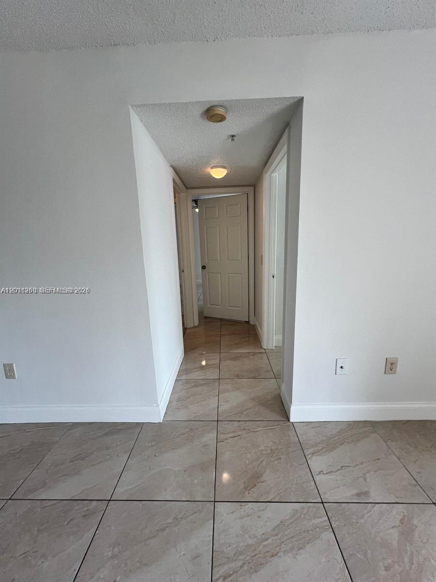 5065 Wiles Rd #103, Coconut Creek FL 33073