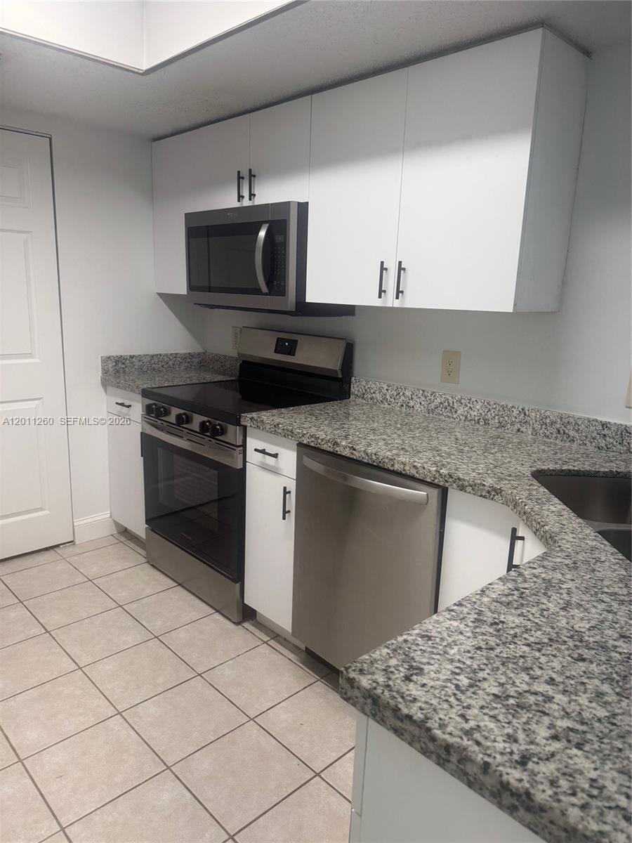5065 Wiles Rd #103, Coconut Creek FL 33073