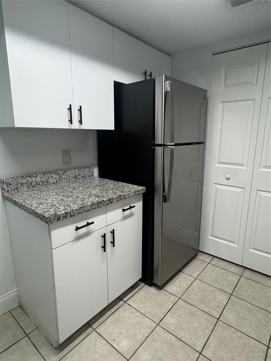 5065 Wiles Rd #103, Coconut Creek FL 33073