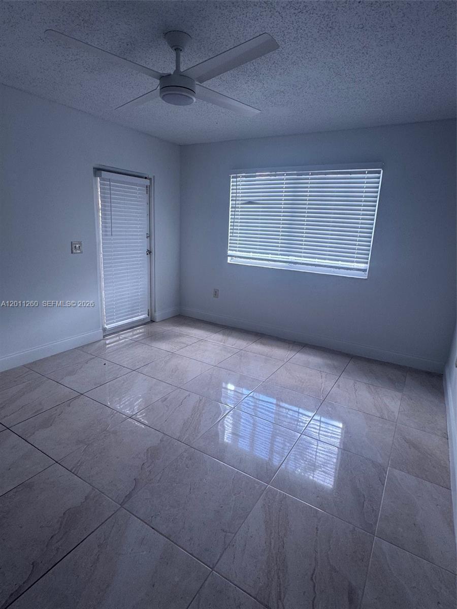 5065 Wiles Rd #103, Coconut Creek FL 33073