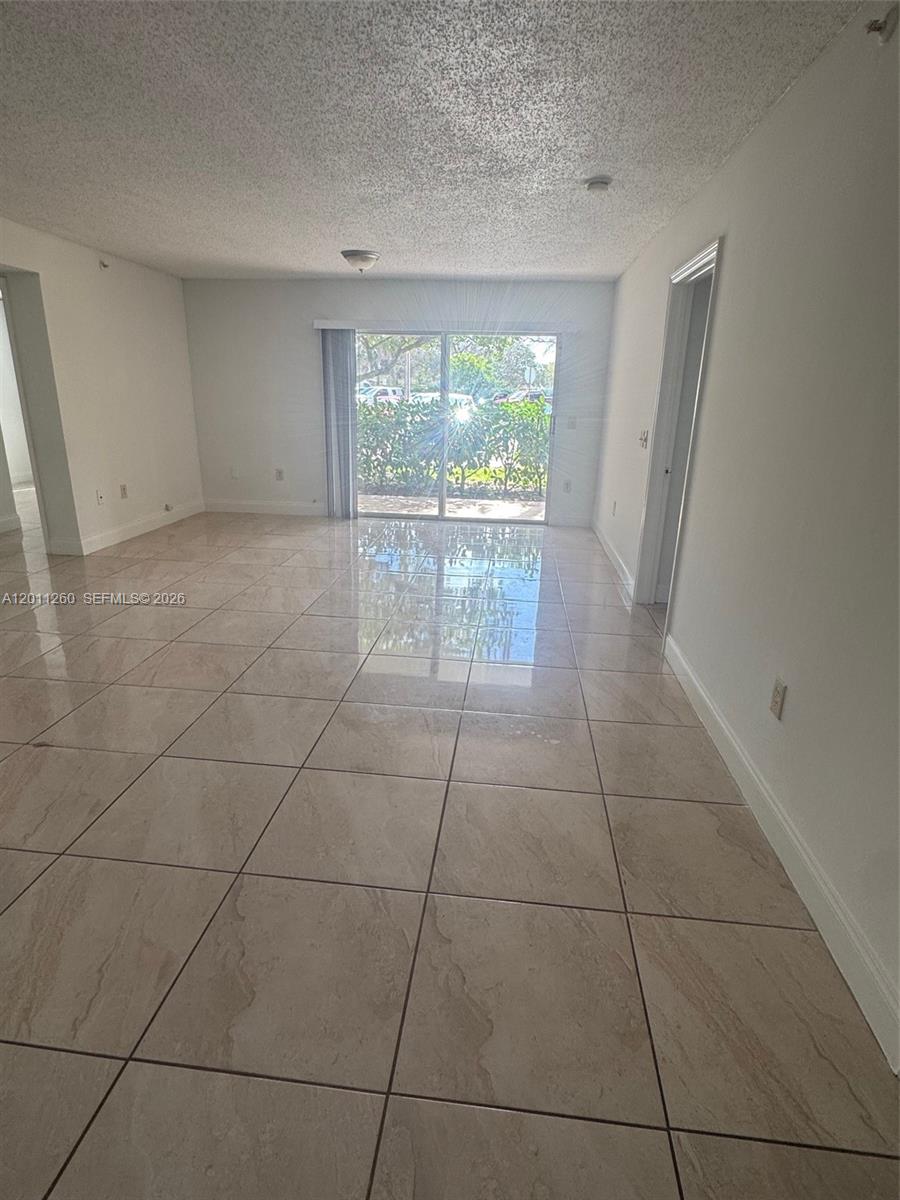 5065 Wiles Rd #103, Coconut Creek FL 33073