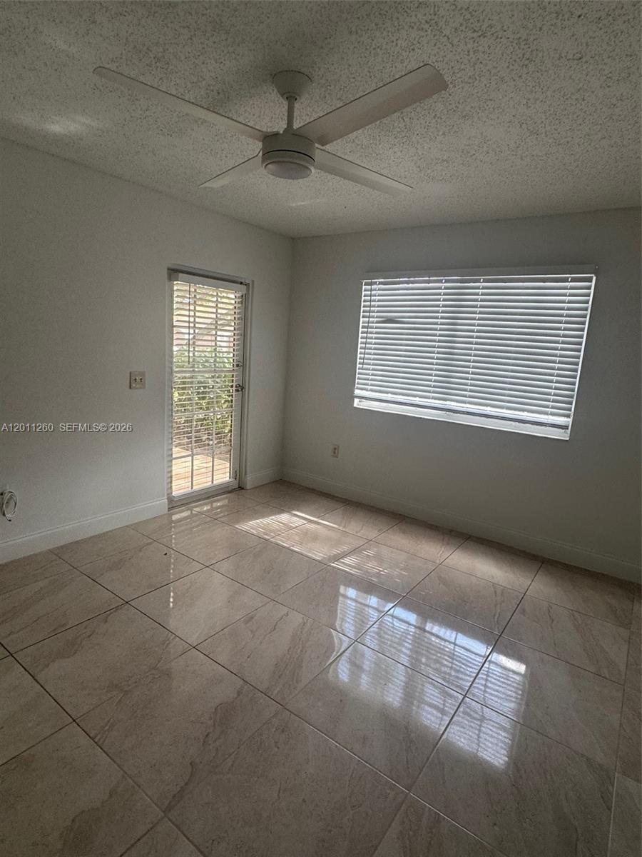 5065 Wiles Rd #103, Coconut Creek FL 33073