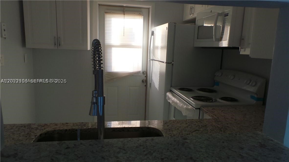 5031 W Oakland Park Blvd #103, Lauderdale Lakes FL 33313