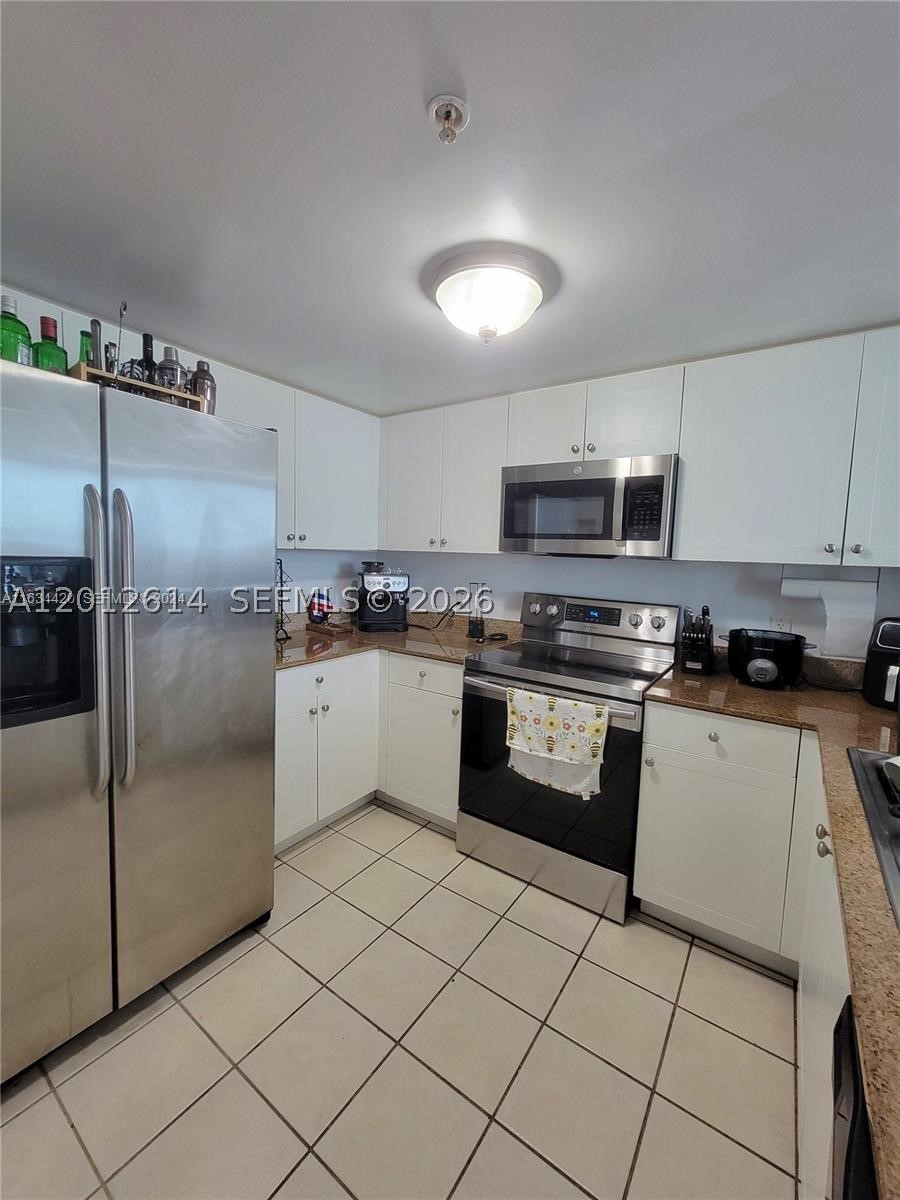 60 NW 37th Ave #1208, Miami FL 33125