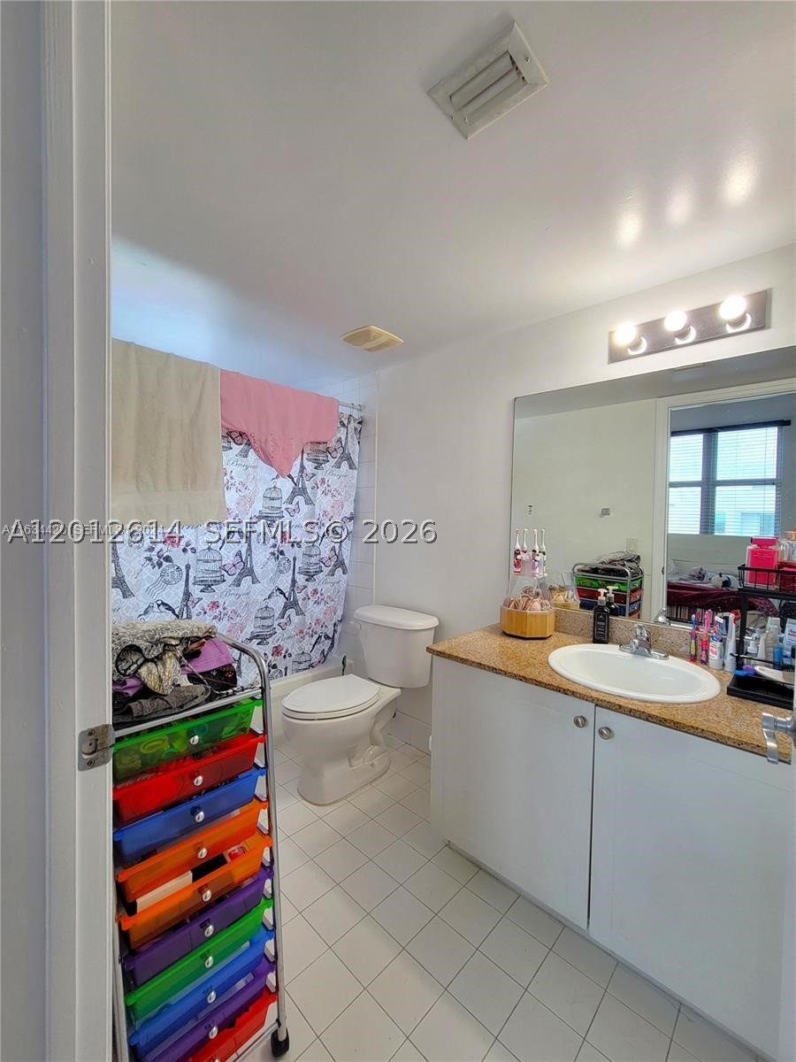 60 NW 37th Ave #1208, Miami FL 33125