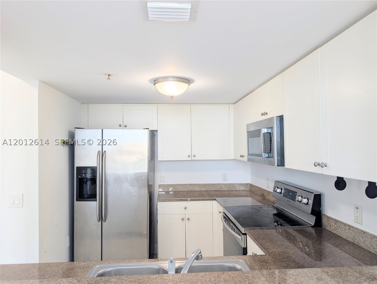 60 NW 37th Ave #1208, Miami FL 33125
