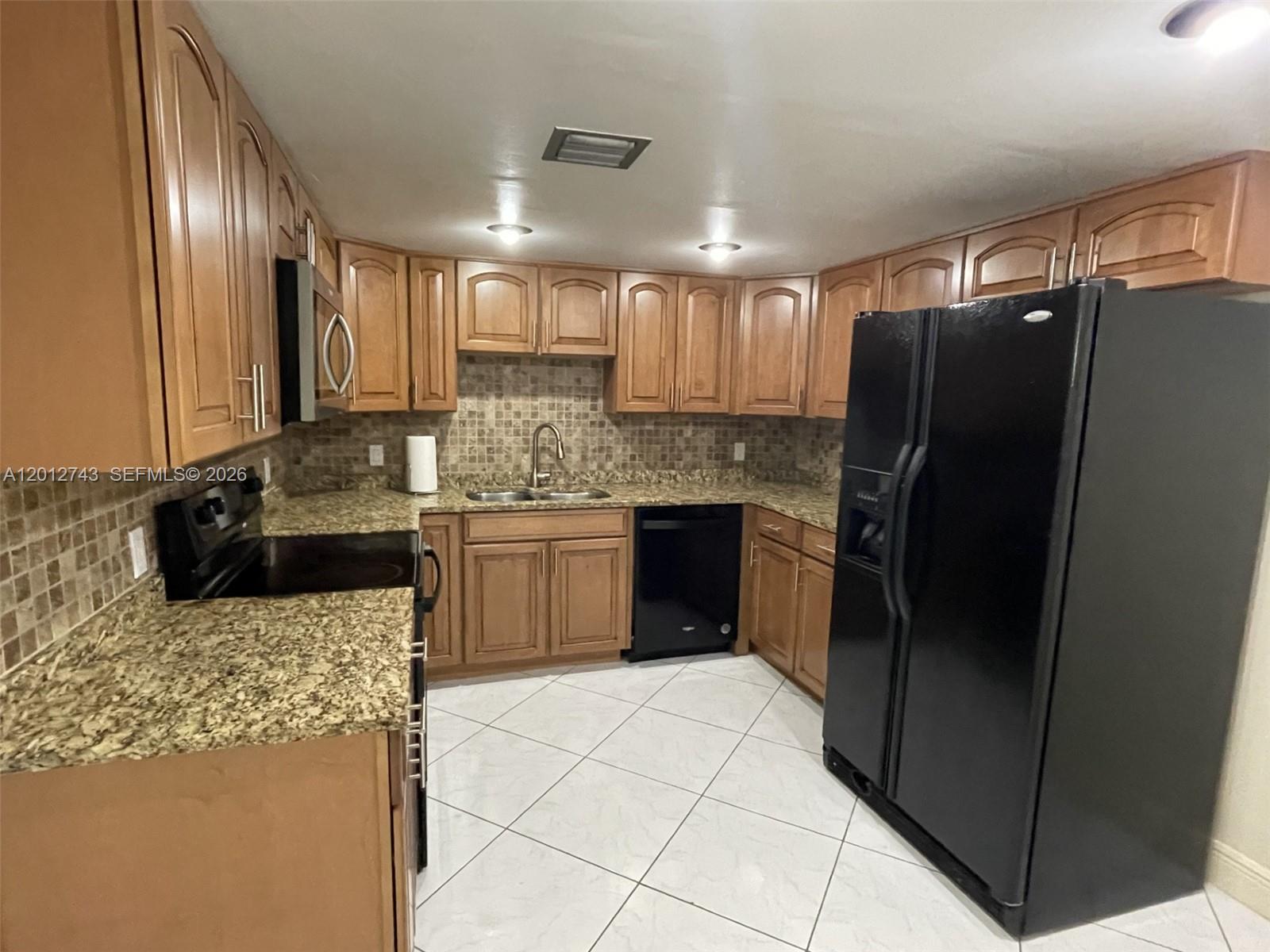 491 Racquet Club Rd #303, Weston FL 33326