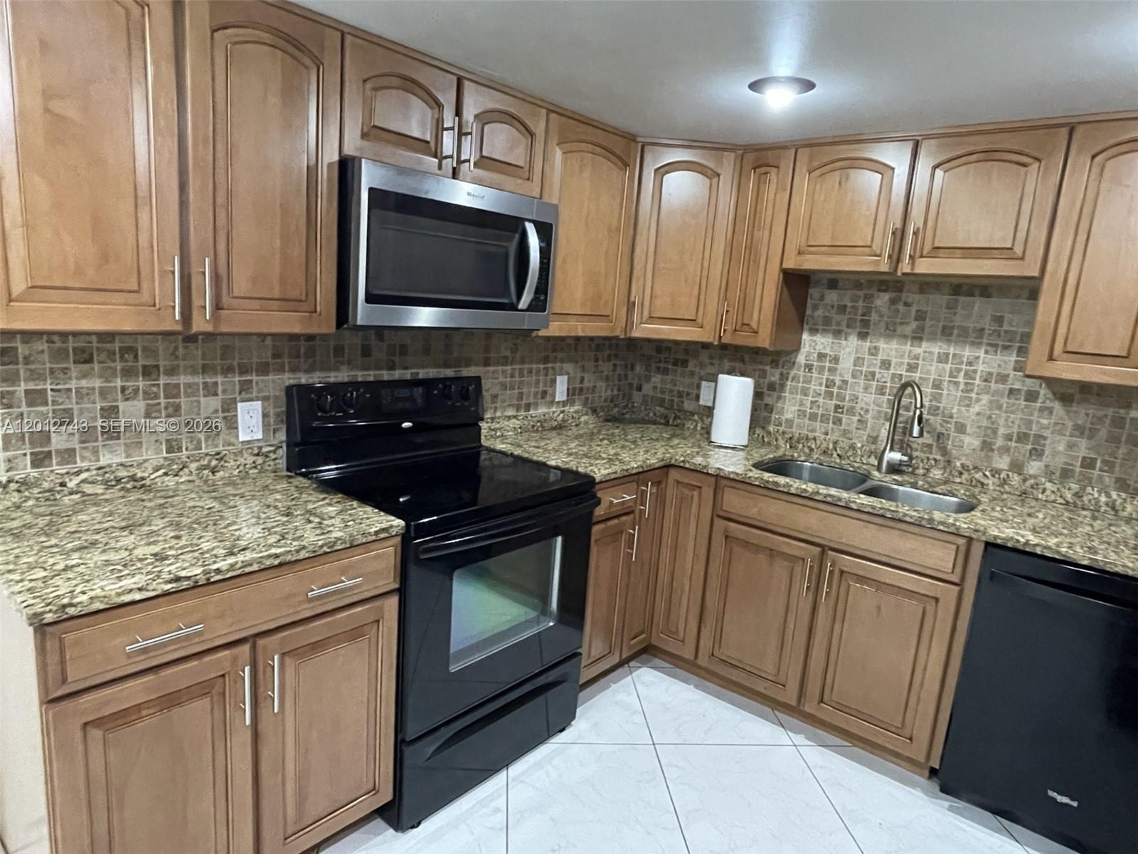 491 Racquet Club Rd #303, Weston FL 33326