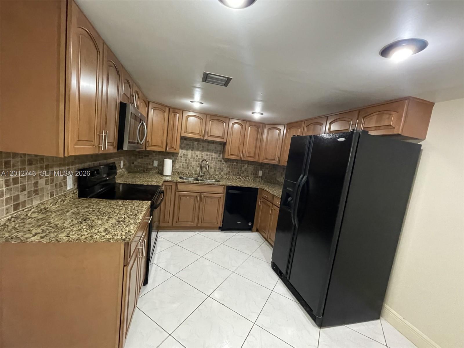 491 Racquet Club Rd #303, Weston FL 33326