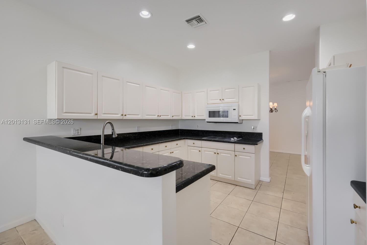 117 Palm Cir, Atlantis FL 33462