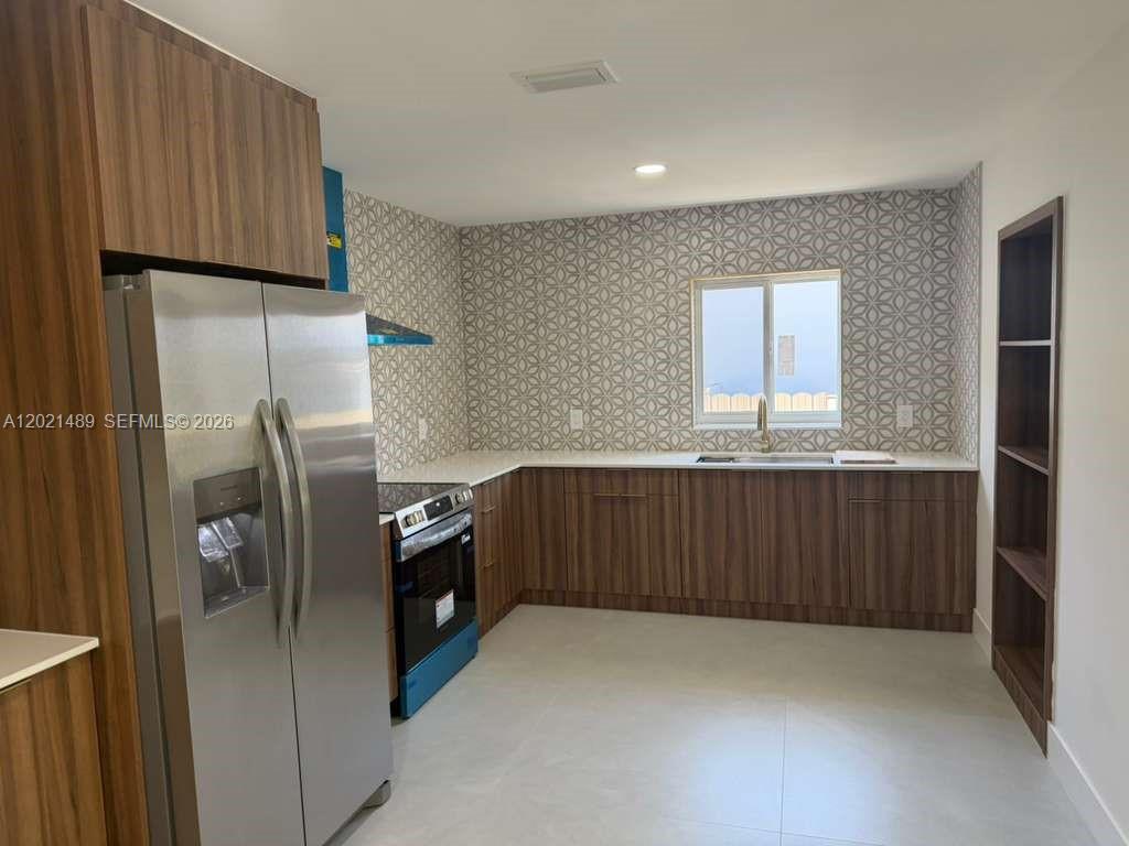 840 NW 67th St, Miami FL 33150