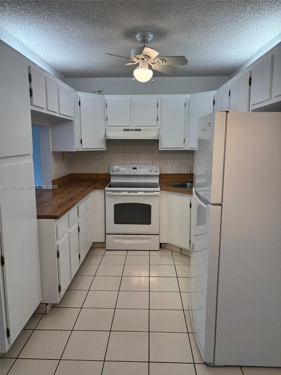 718 Sunny Pine Way #H2, Green Acres FL 33415