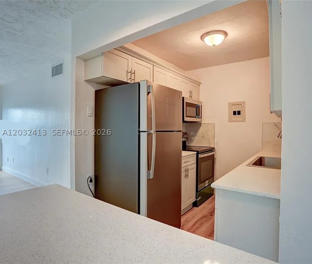 5501 NW 7th St #E408, Miami FL 33126