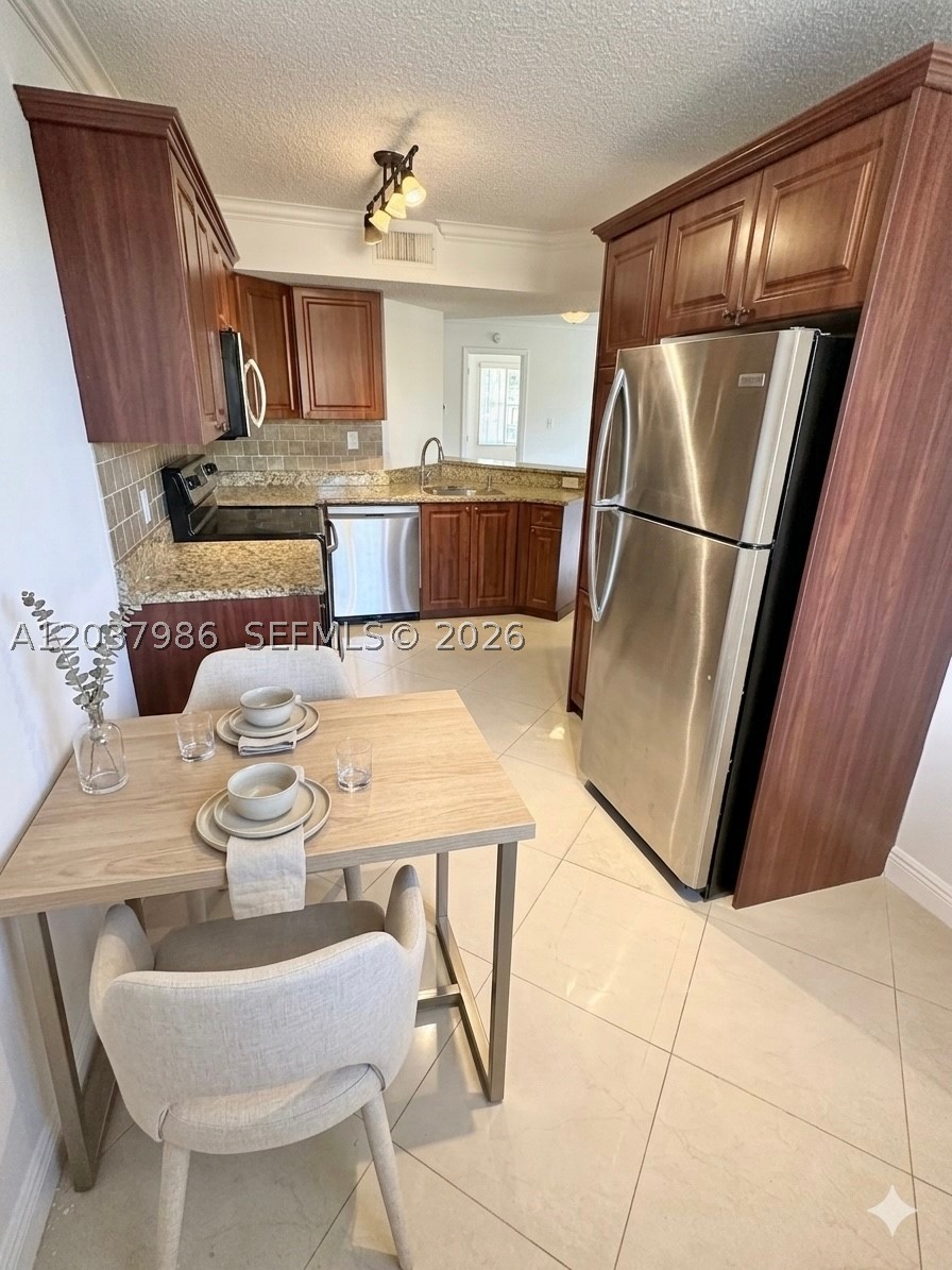 8955 Wiles Rd #208, Coral Springs FL 33067