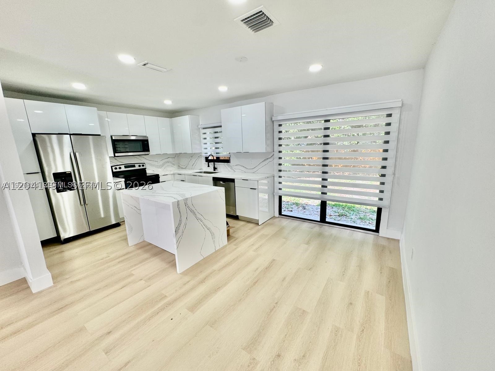 4131 NW 11th Pl, Miami FL 33127