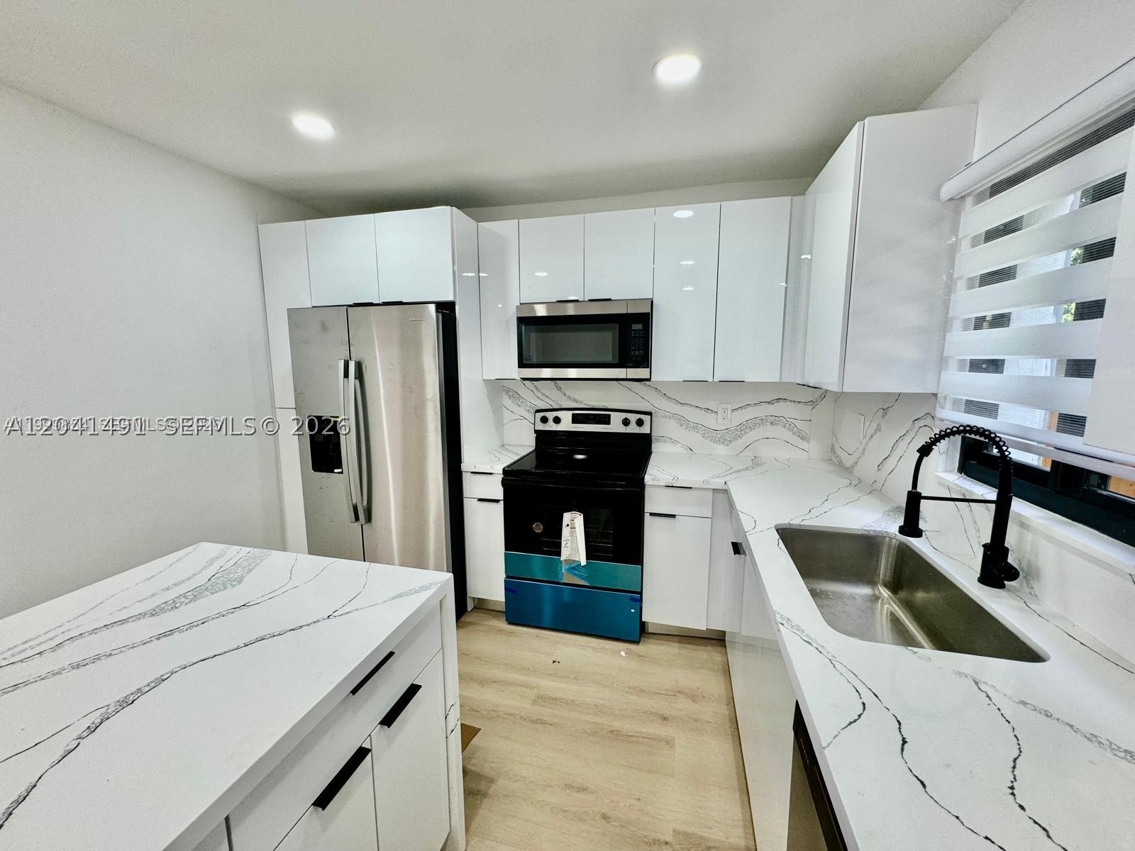 4131 NW 11th Pl, Miami FL 33127