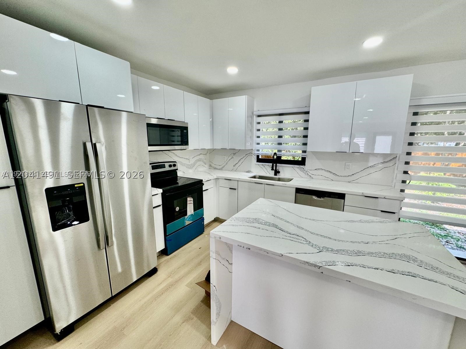 4131 NW 11th Pl, Miami FL 33127
