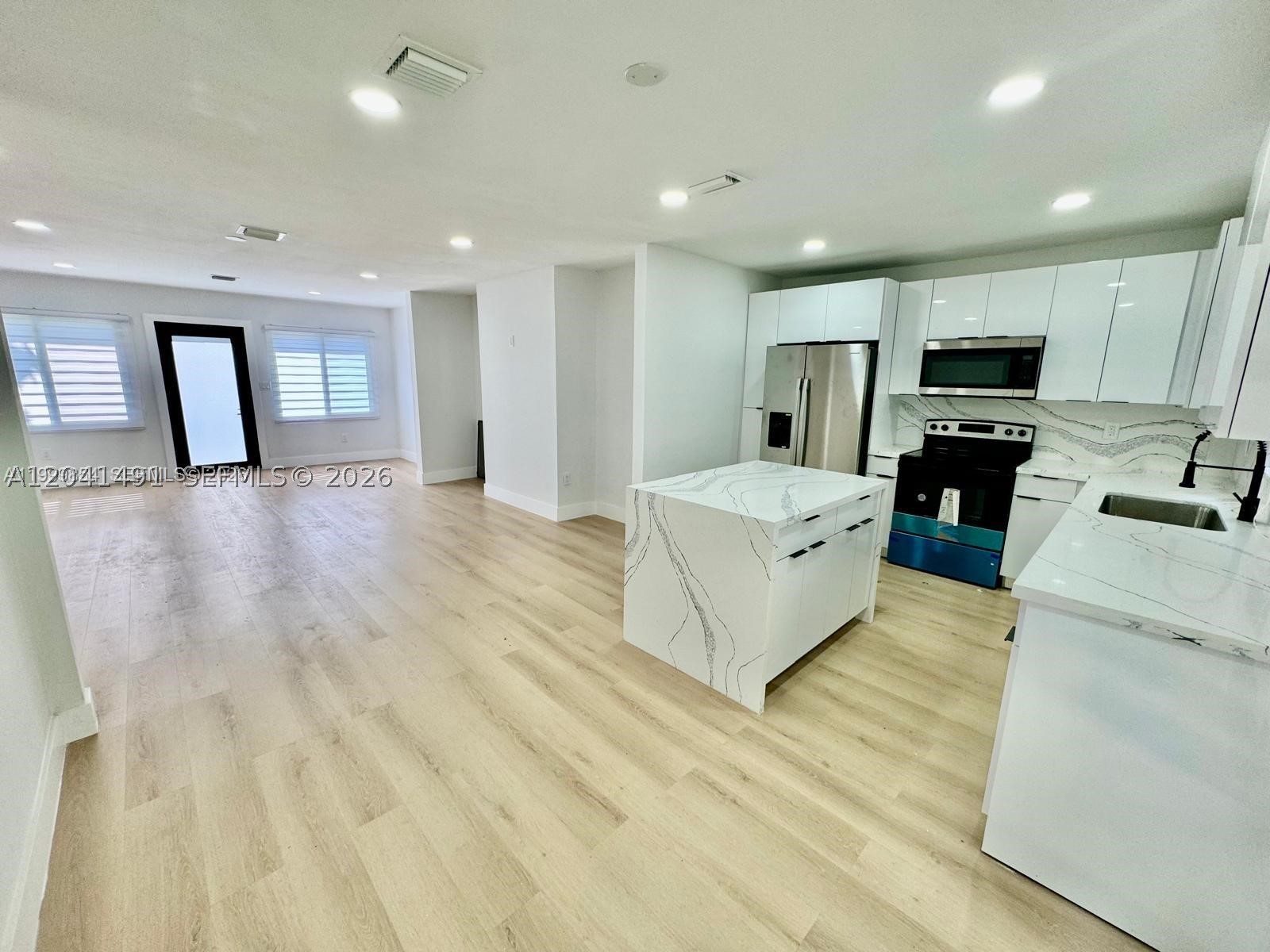 4131 NW 11th Pl, Miami FL 33127