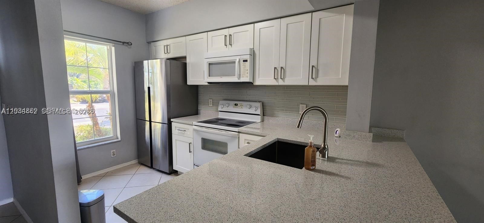 211 Mallory Ct #211+ DEN/OFFICE SPACE, Weston FL 33326