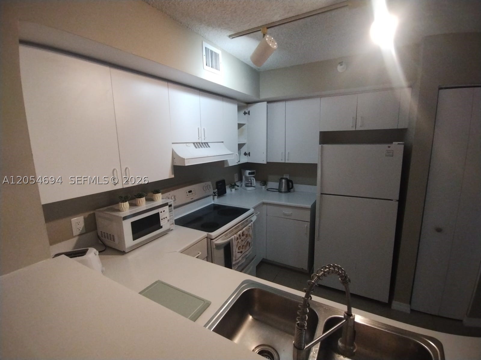 111 Yacht Club Way #107, Hypoluxo FL 33462