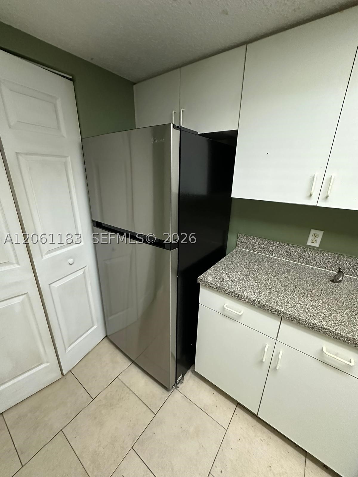5005 Wiles Rd #102, Coconut Creek FL 33073