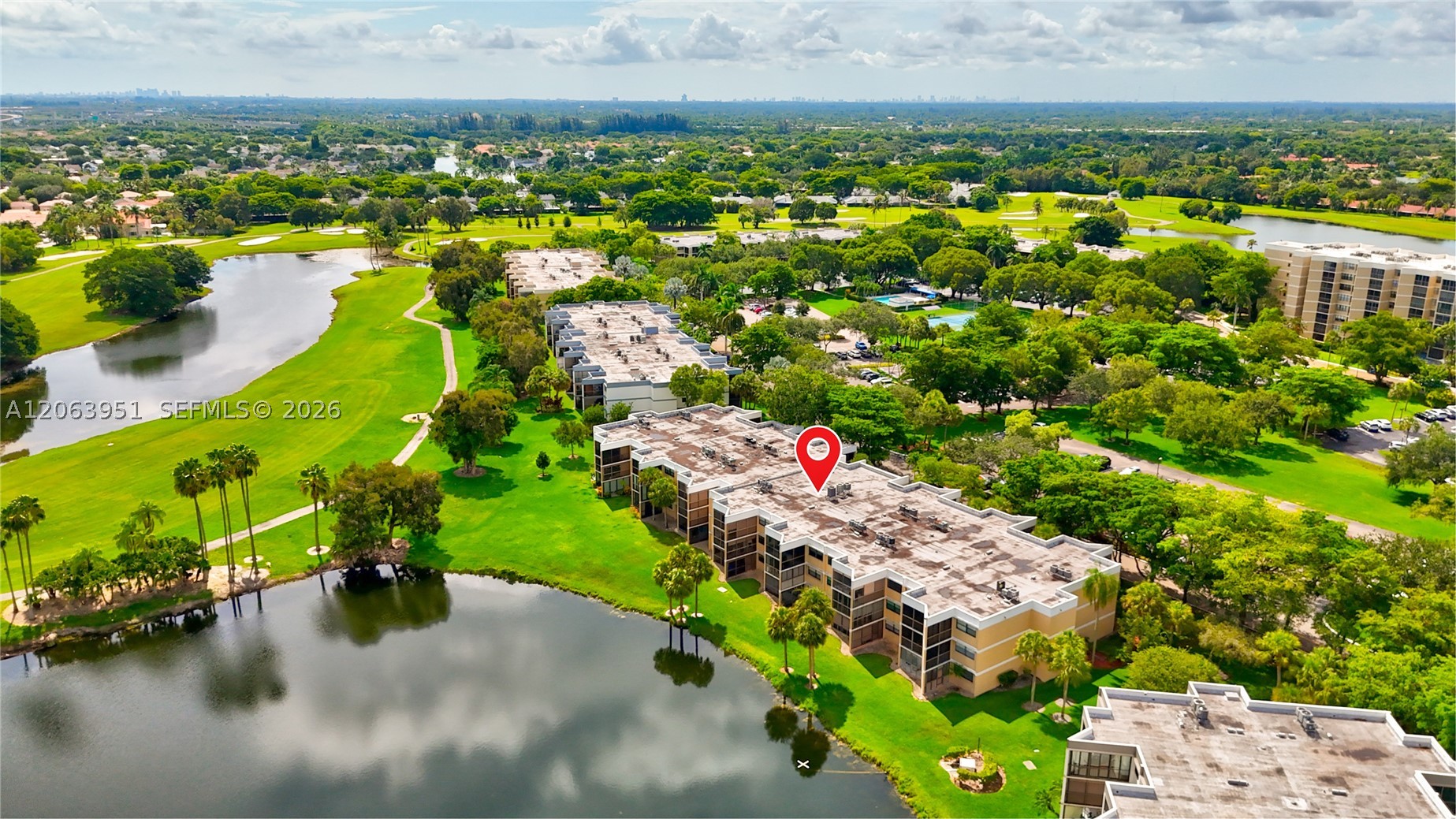 16325 Golf Club Rd #101, Weston FL 33326