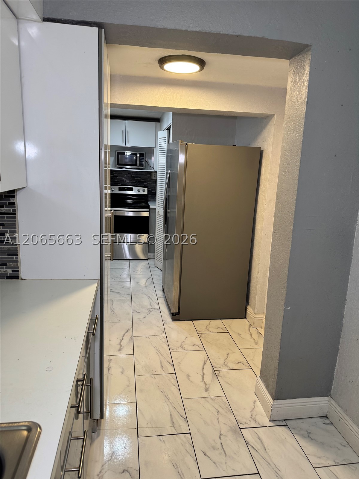 350 NW 58th Ave, Miami FL 33126