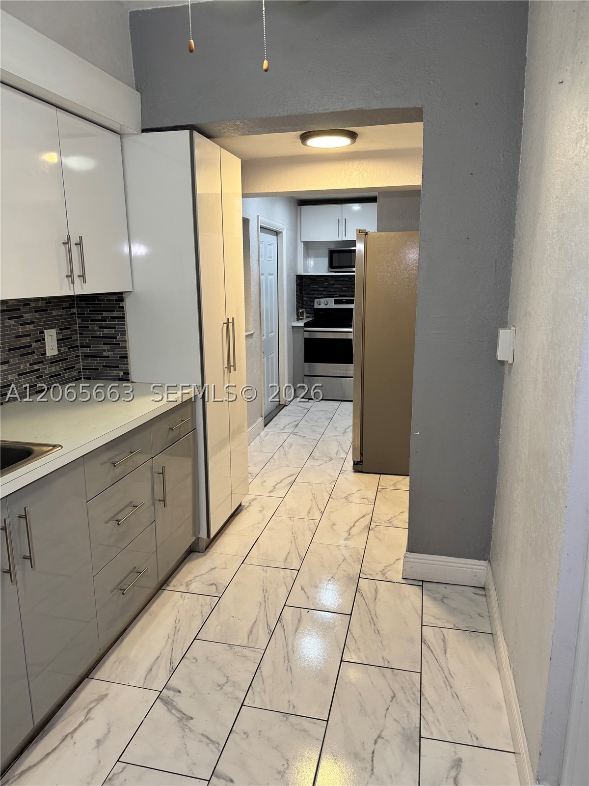 350 NW 58th Ave, Miami FL 33126
