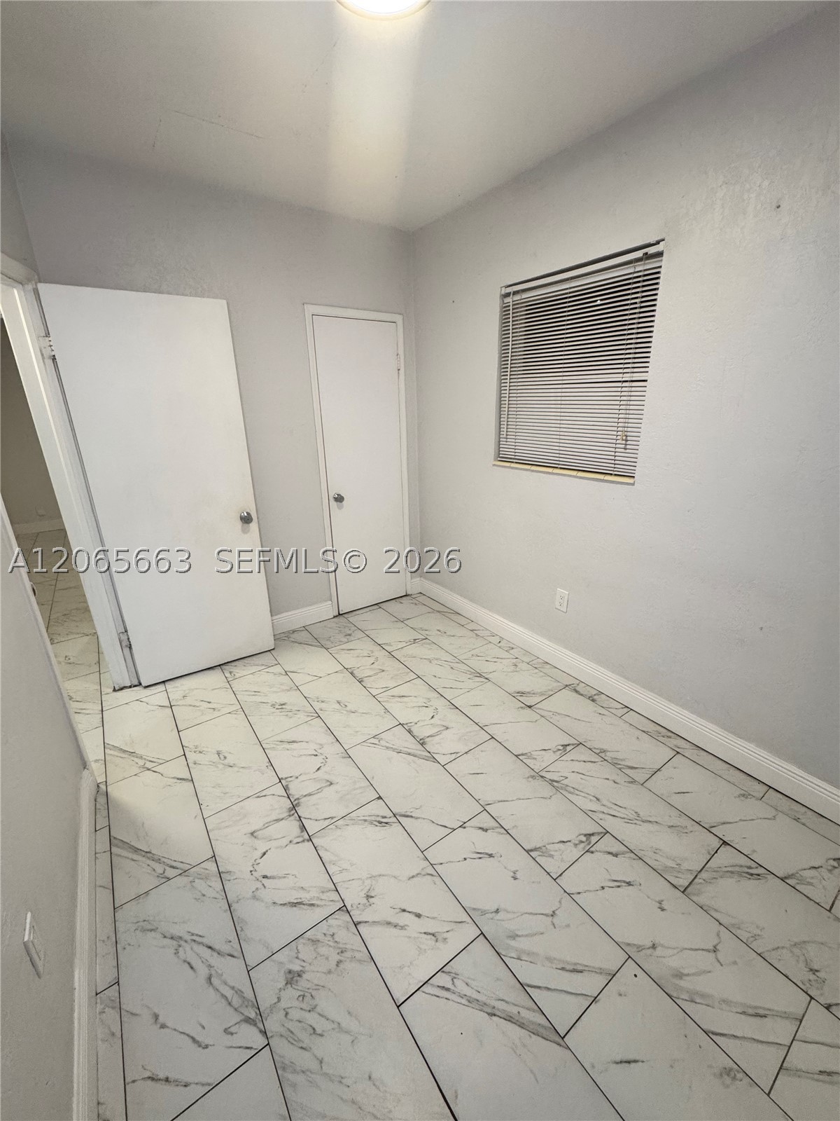 350 NW 58th Ave, Miami FL 33126