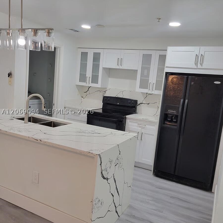 5840 W Sample Rd #302, Coral Springs FL 33067