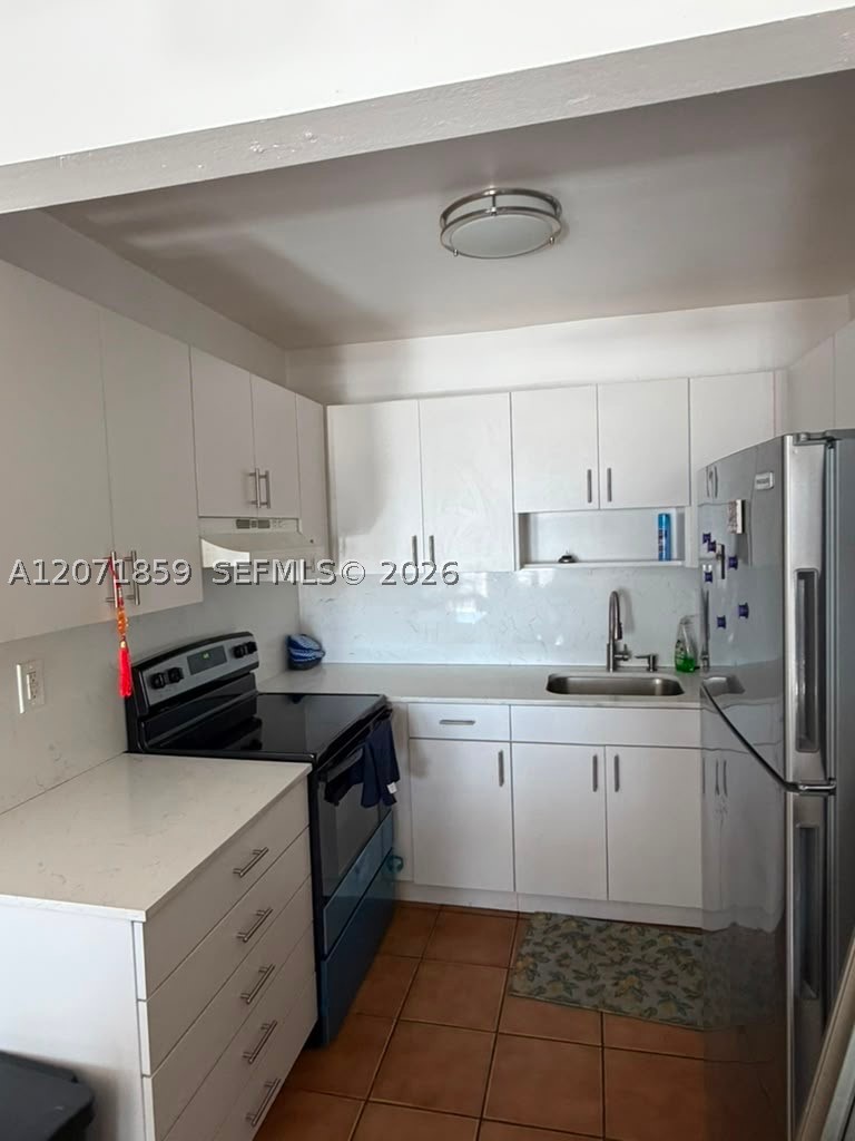 3640 NW 9 #407, Miami FL 33125