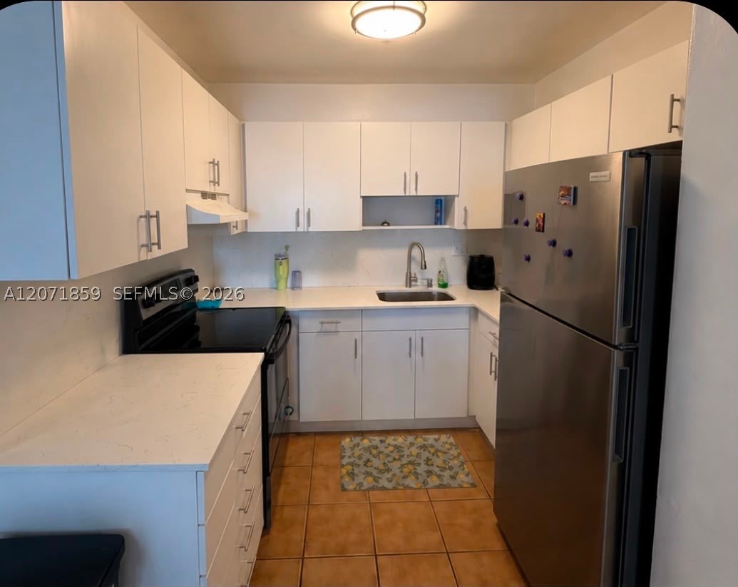 3640 NW 9 #407, Miami FL 33125