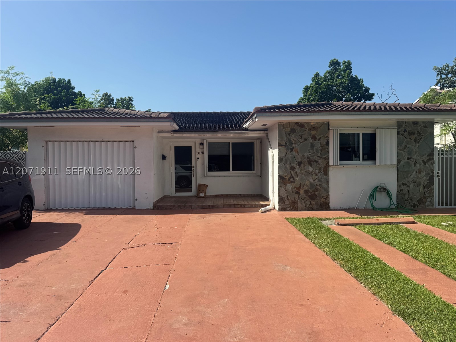 3160 NW 3rd St, Miami FL 33125