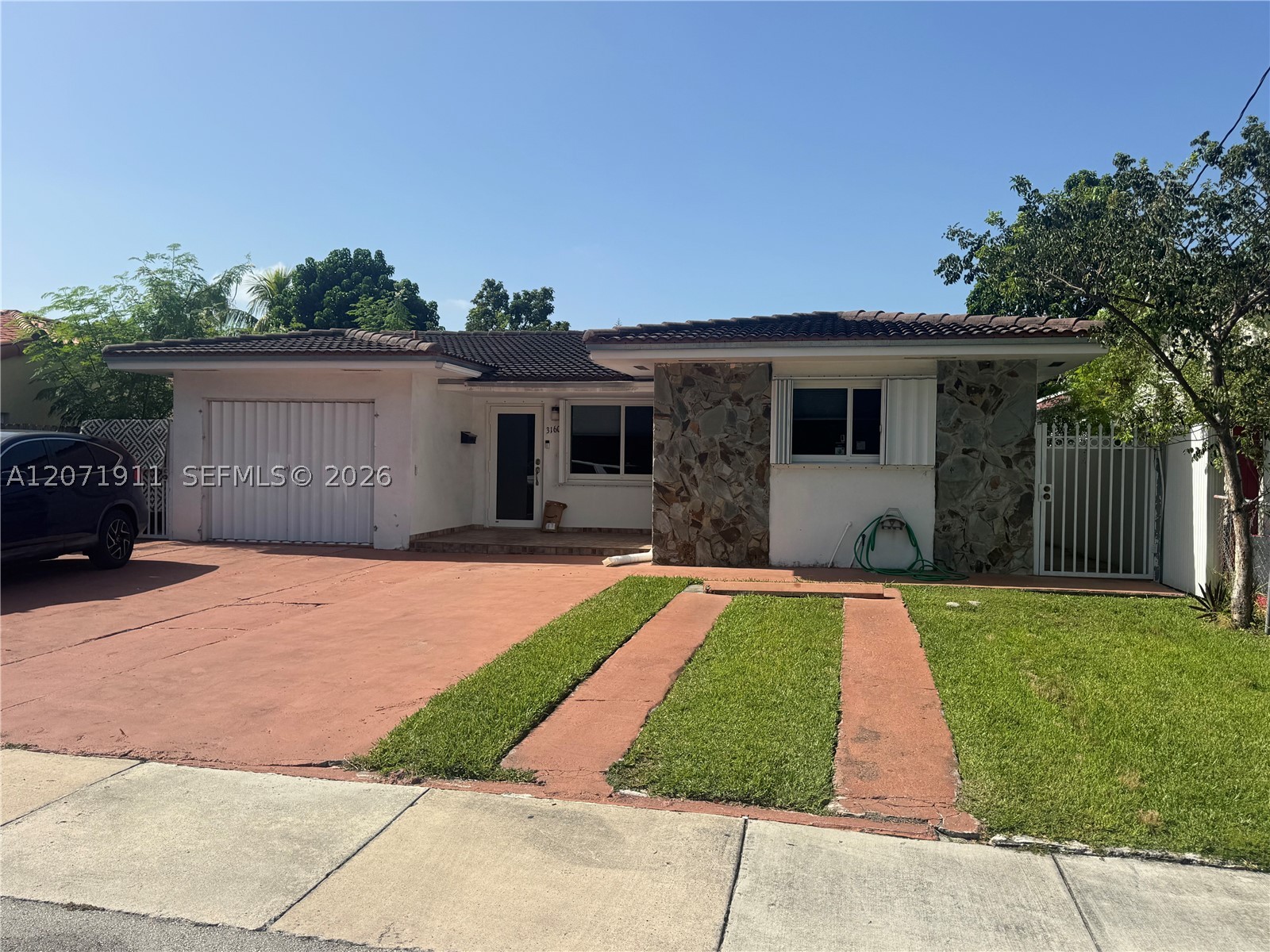 3160 NW 3rd St, Miami FL 33125
