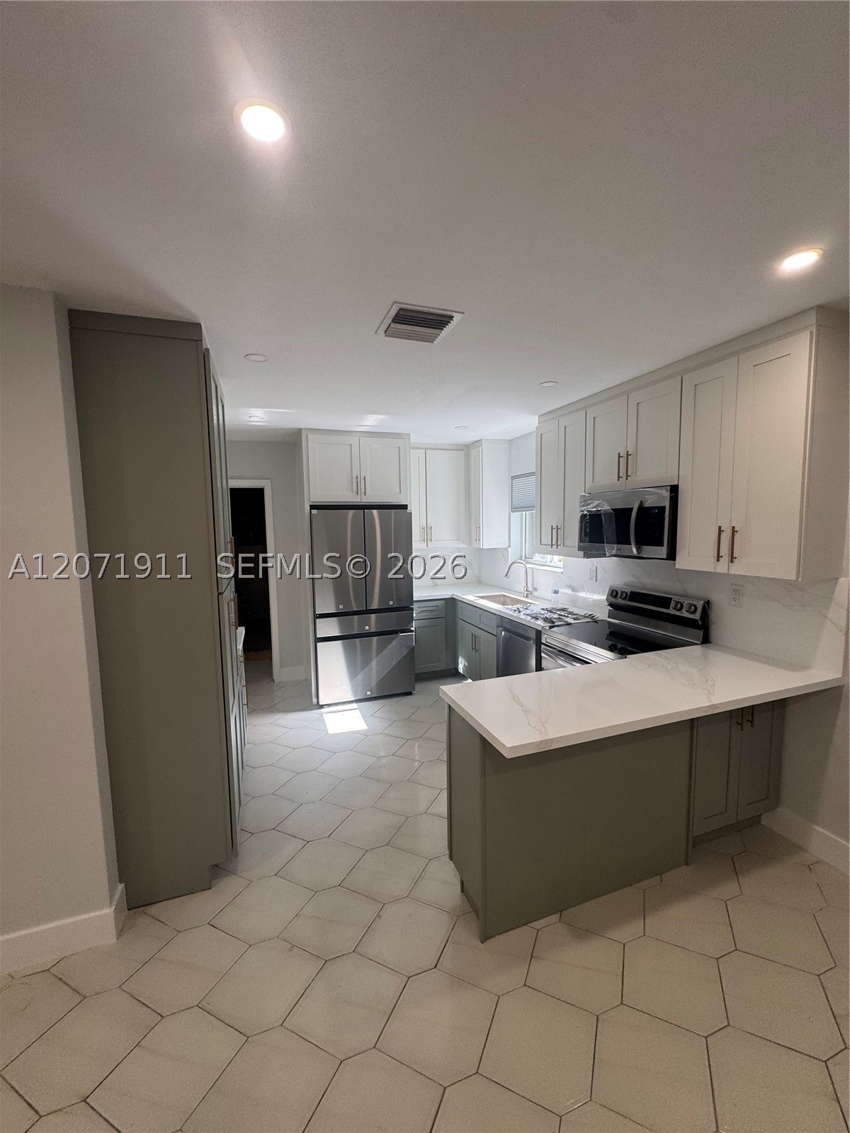 3160 NW 3rd St, Miami FL 33125