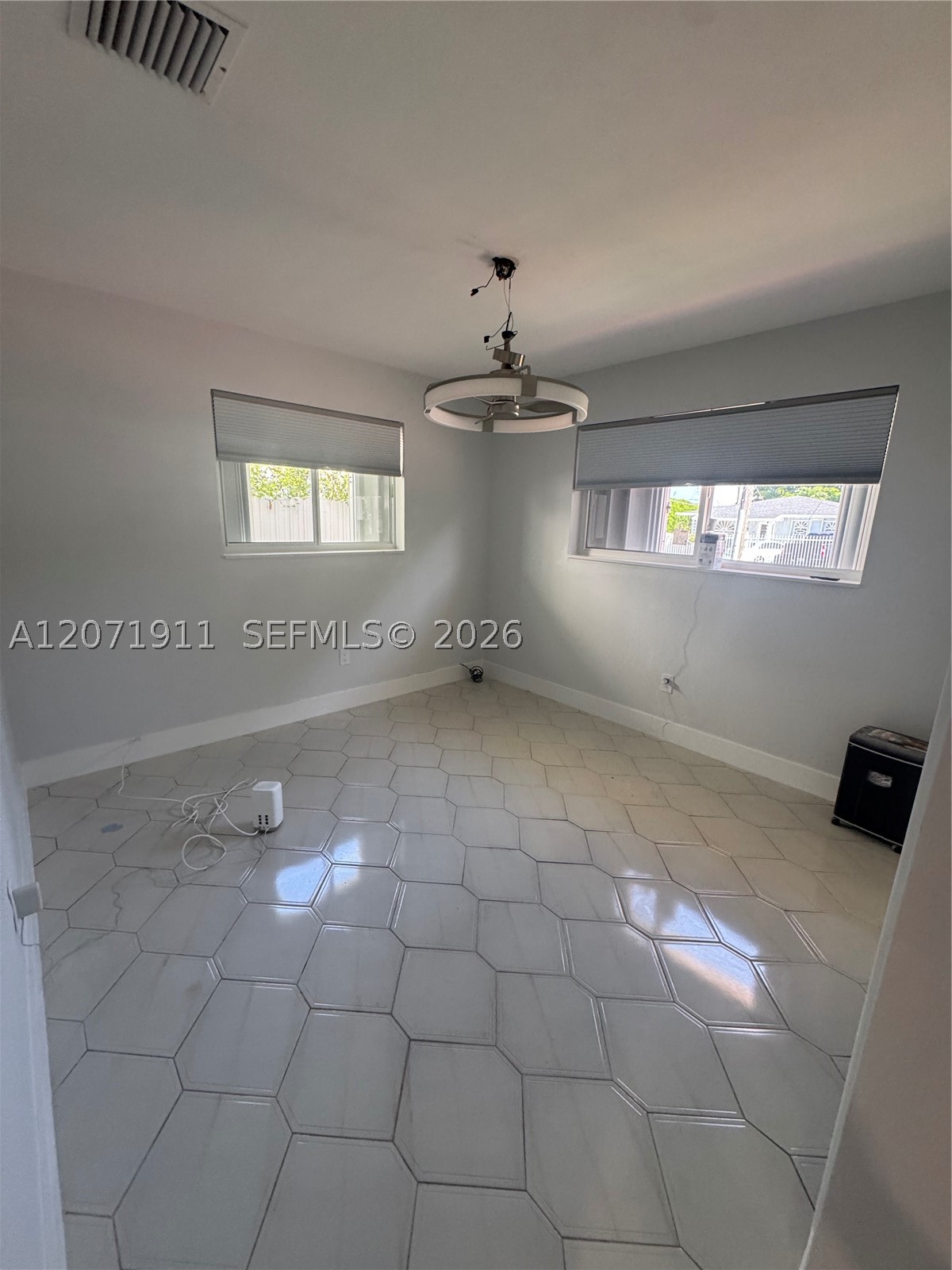 3160 NW 3rd St, Miami FL 33125