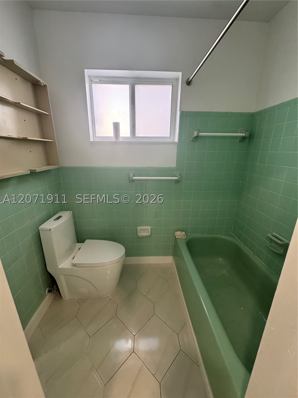 3160 NW 3rd St, Miami FL 33125