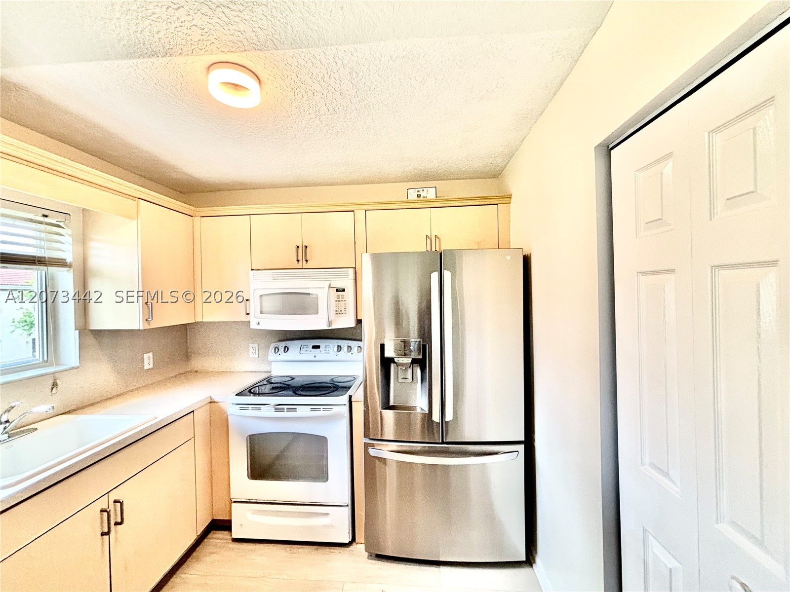 3481 Briar Bay Blvd #206, West Palm Beach FL 33411