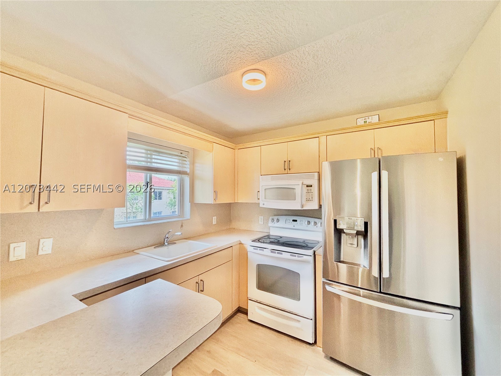 3481 Briar Bay Blvd #206, West Palm Beach FL 33411