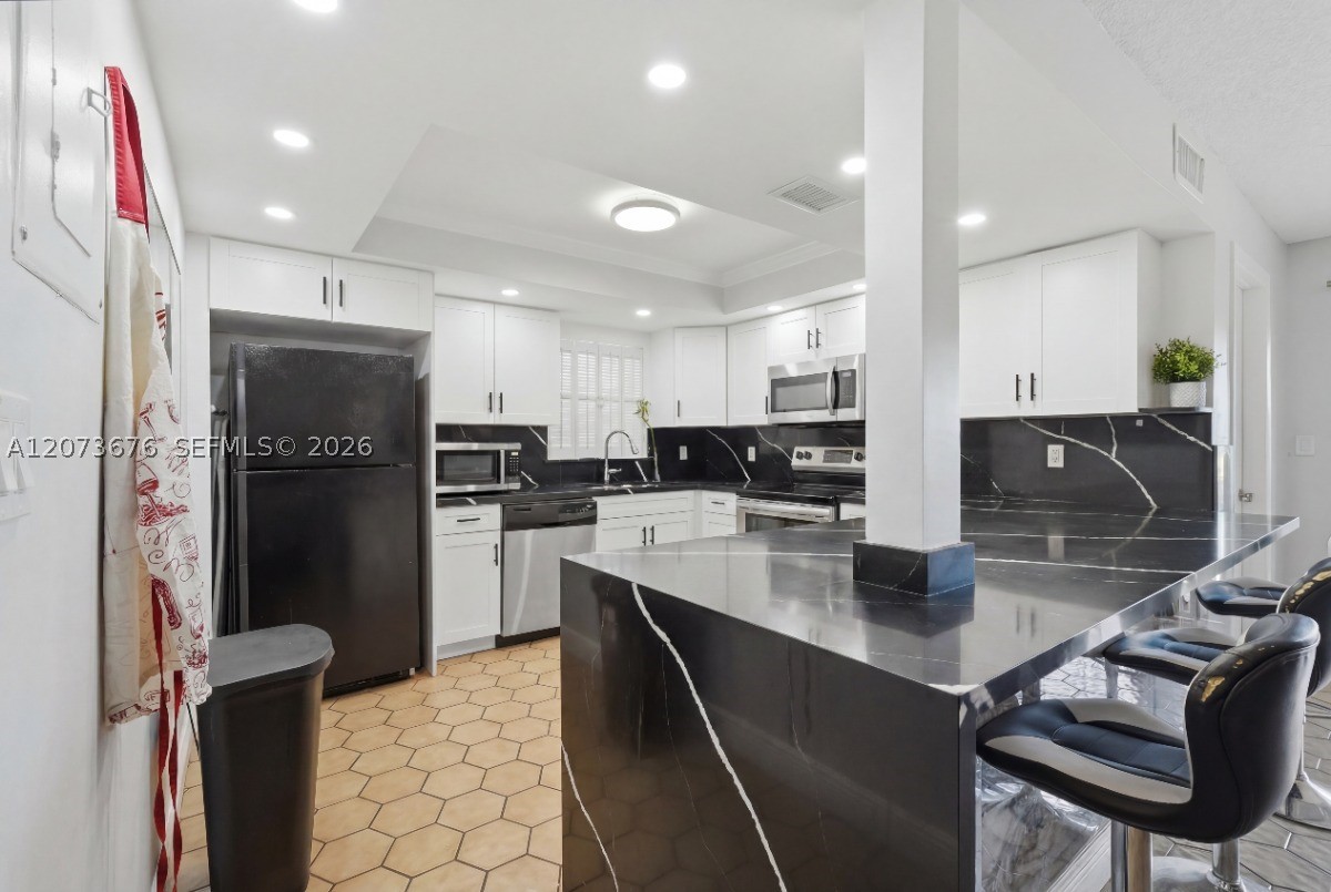 7460 Woodmont Ter #101, Tamarac FL 33321