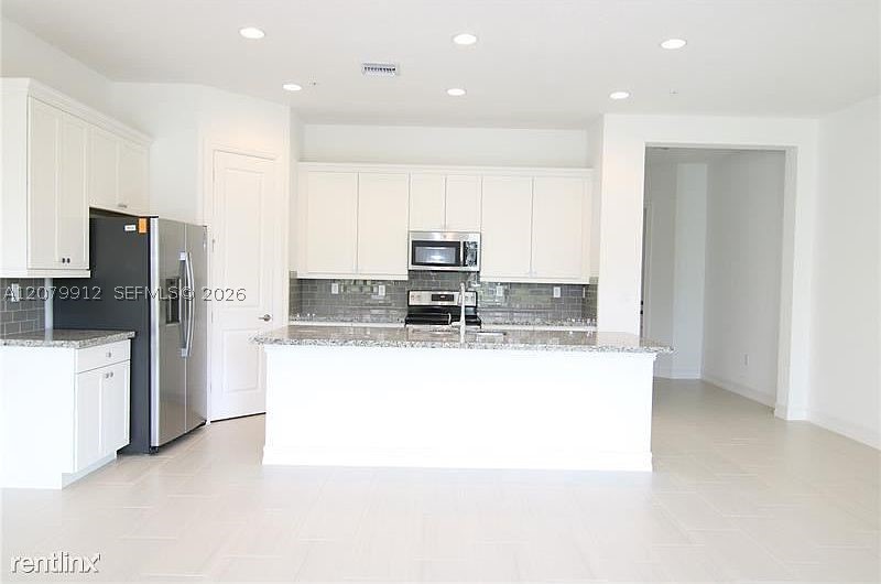 11776 SW 13th LN #11776, Pembroke Pines FL 33025