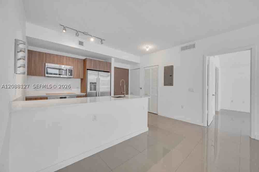 201 SW 17th Rd #302, Miami FL 33129