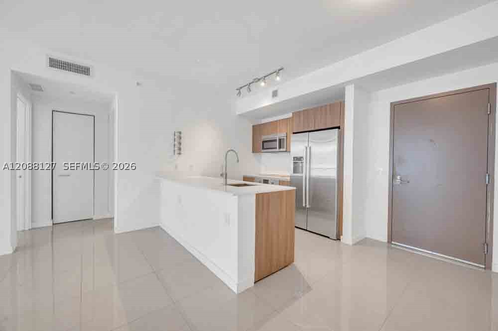 201 SW 17th Rd #302, Miami FL 33129