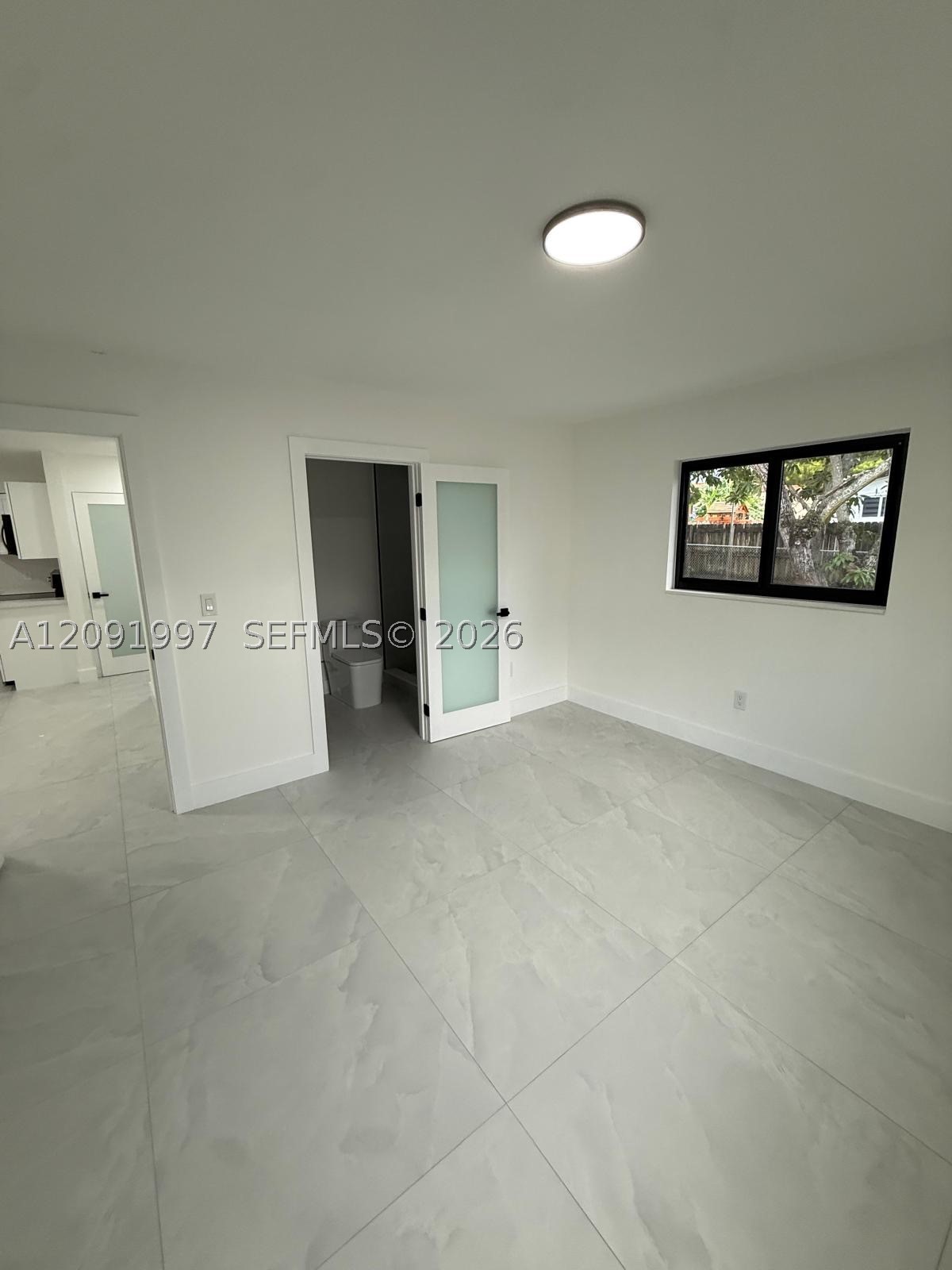 3151 NW 2nd St, Miami FL 33125