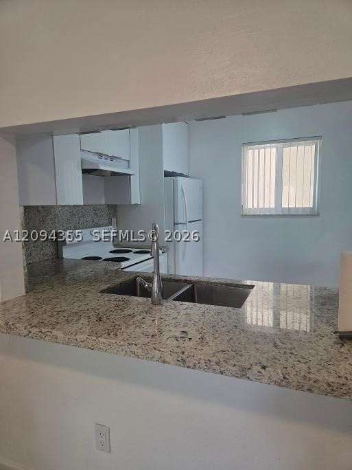 7707 Camino Real #310, Miami FL 33143
