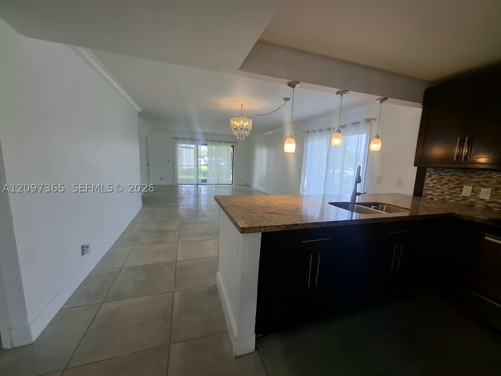 320 Racquet Club Rd #104, Weston FL 33326