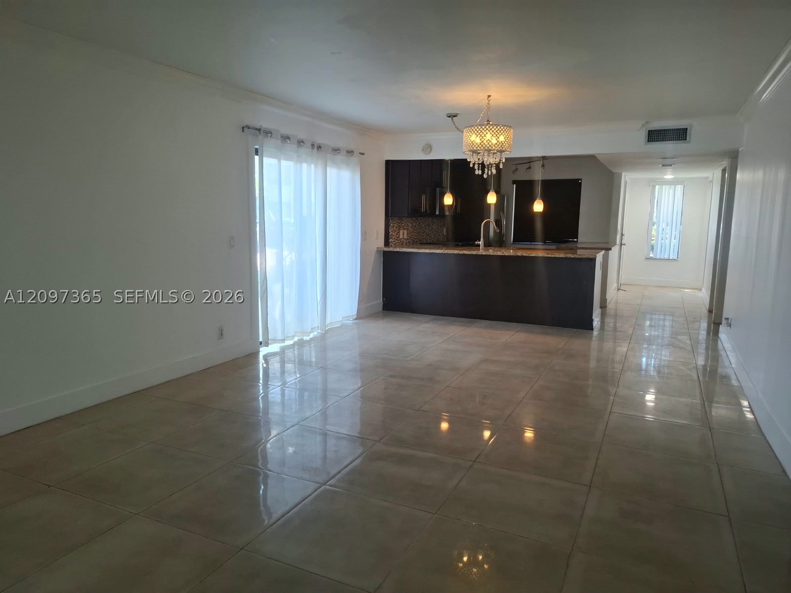 320 Racquet Club Rd #104, Weston FL 33326