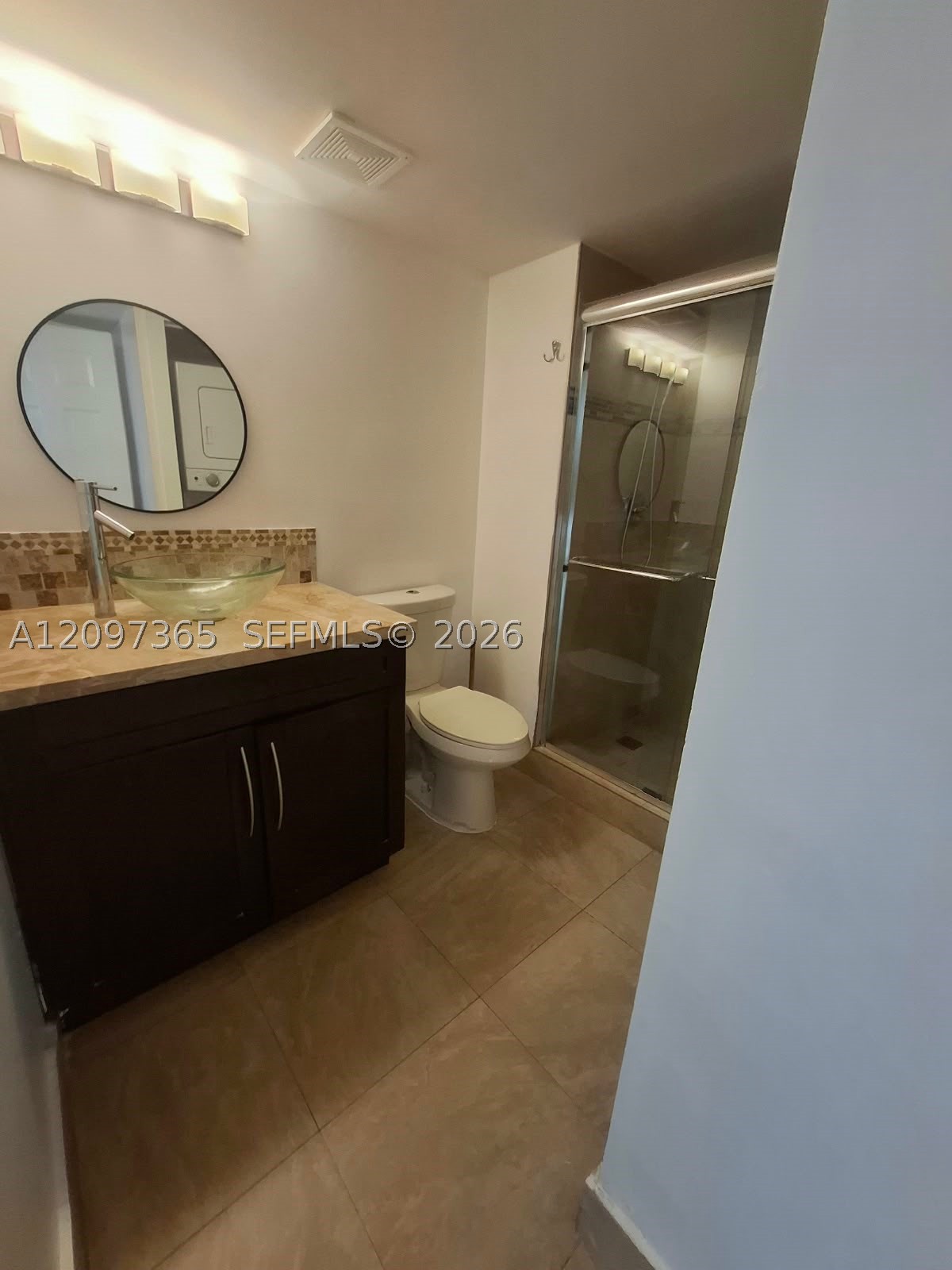 320 Racquet Club Rd #104, Weston FL 33326