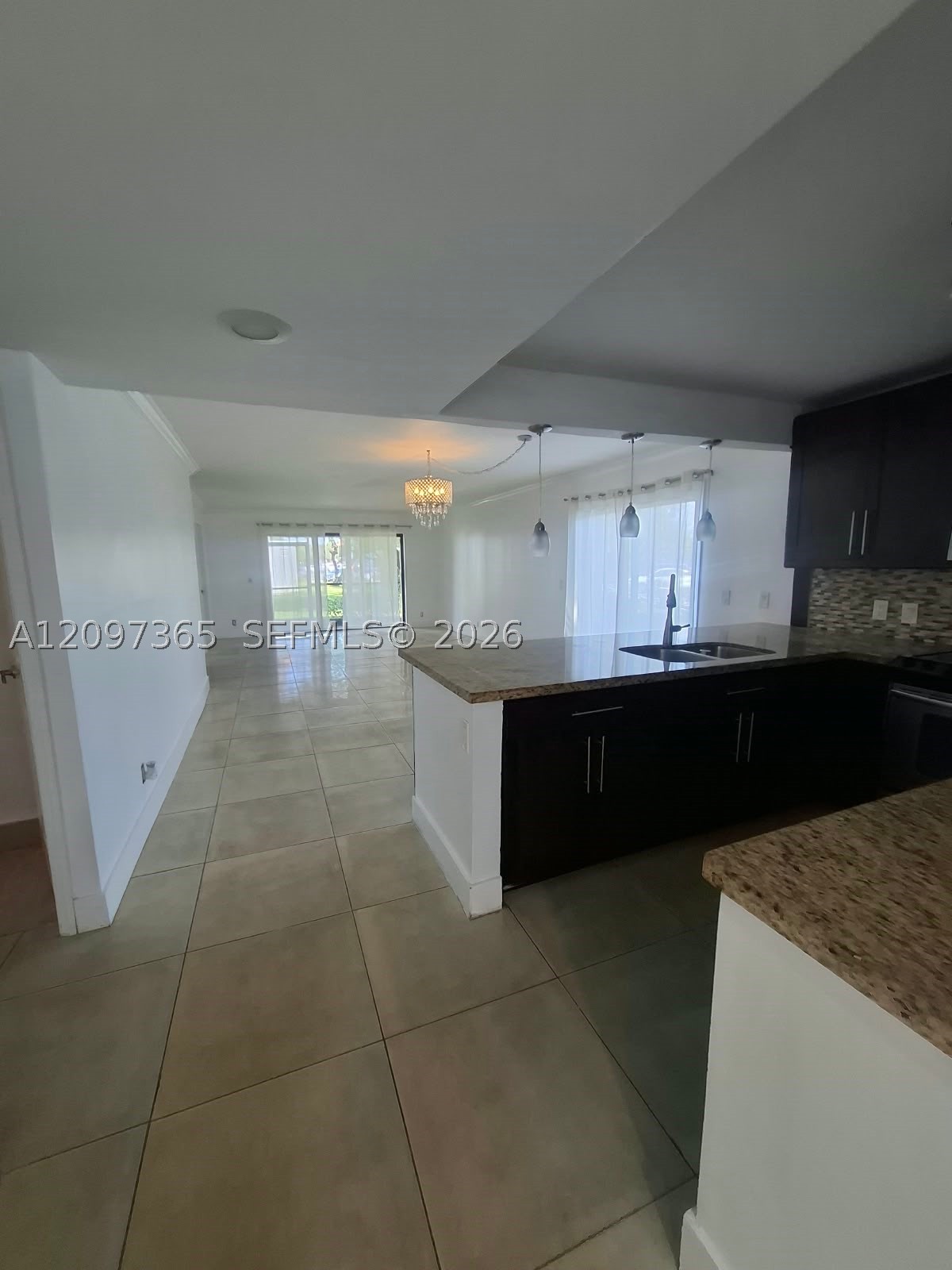 320 Racquet Club Rd #104, Weston FL 33326