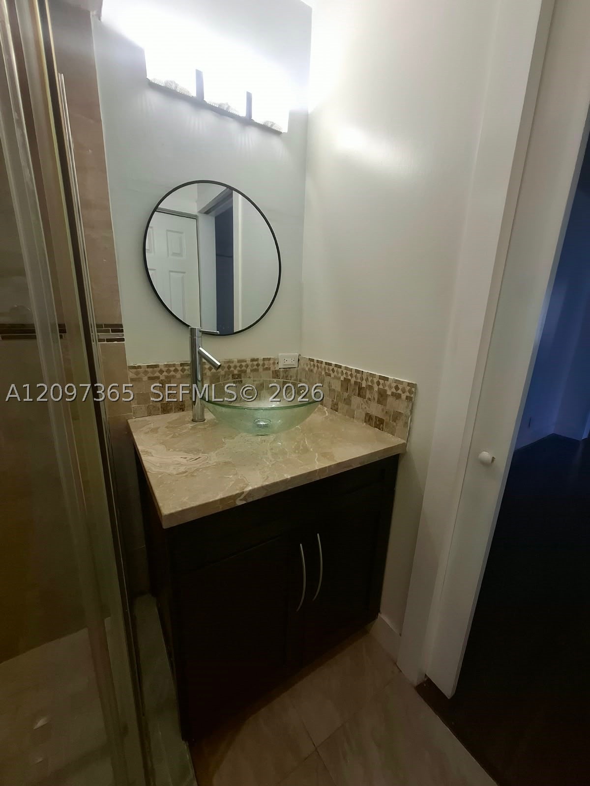 320 Racquet Club Rd #104, Weston FL 33326